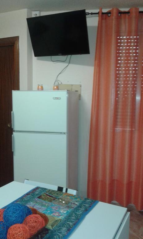 Comet Suites Almona Granada Habitación foto