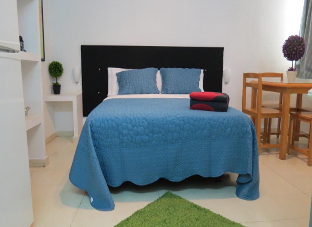 Comet Suites Almona Granada Habitación foto