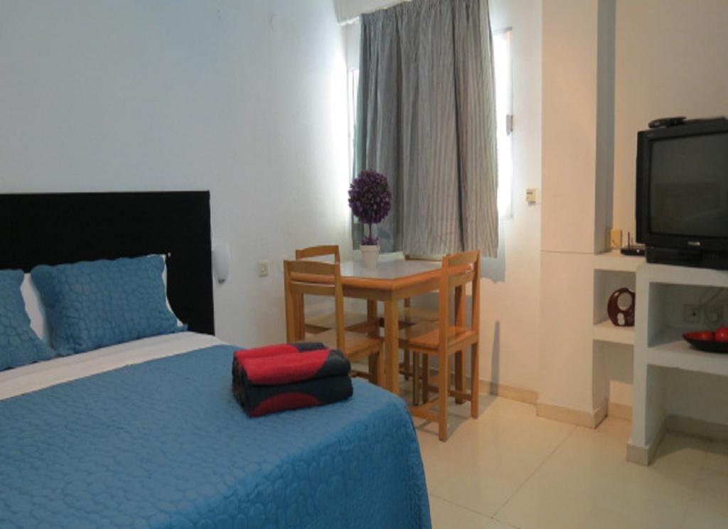 Comet Suites Almona Granada Habitación foto