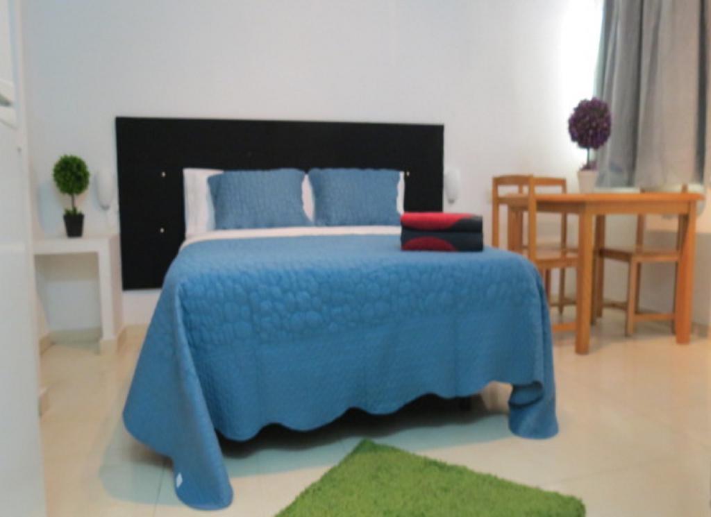 Comet Suites Almona Granada Habitación foto